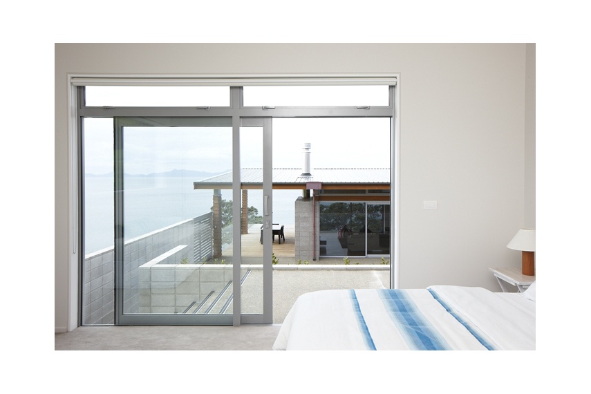A Euroslider® with overlights with opening awning sashes